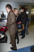 Ashley Benson & Shay Mitchell - Arriving at JFK Airport in NYC - 03/17/2014